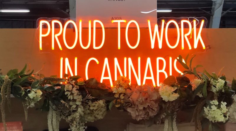 proud to work in cannabis sign at vangst booth at hall of flowers 2023